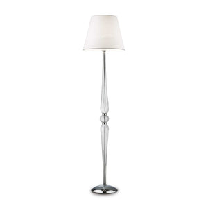 Base e struttura centrale in metallo cromato. Elementi decorativi in vetro soffiato e lavorato a mano. Paralume in lamina di PVC, rivestita in tessuto.