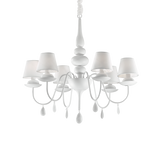 Montatura in metallo rifinito con smalto satinato bianco o nero. Paralumi in lamina di PVC rivestita di tessuto bianco o nero. Copricatena in velluto.