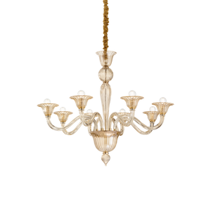 Lampadario in vetro soffiato e lavorato artigianalmente con montatura in metallo e copricatena in velluto.